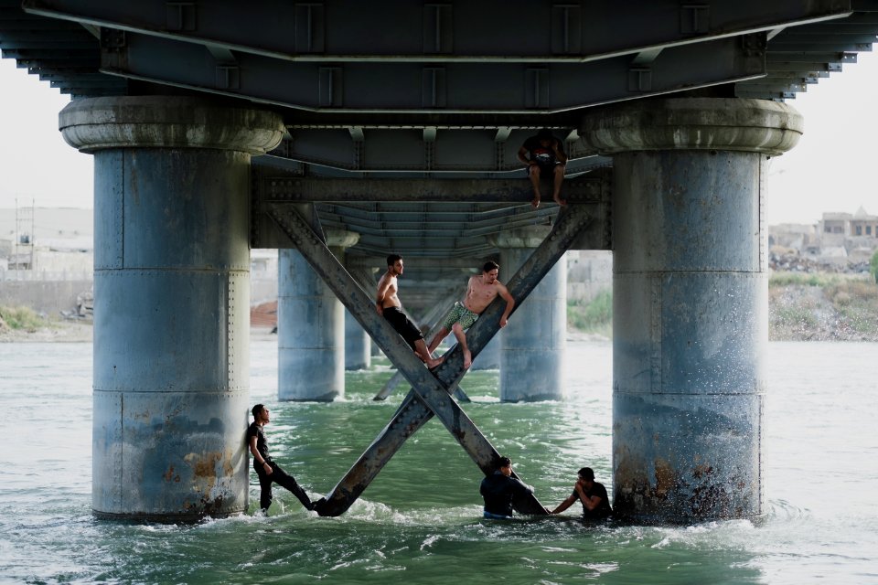 Views along the river Tigris in Mosul in 2019 when Moslawis go during the summer to cool down 22