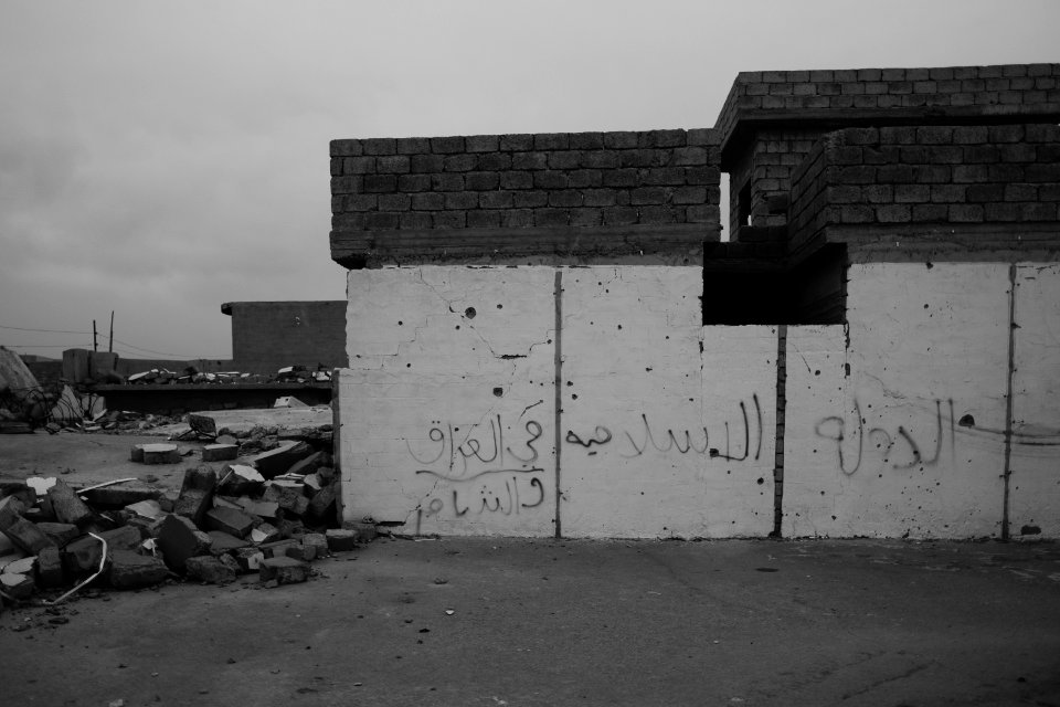 Views of Islamic State graffiti in May of 2019 around downtown Shingal at sunset 17