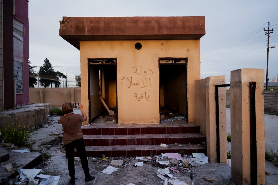 Views of Islamic State graffiti around the ruined ID card office in Shingal in April of 2019, following war with the Islamic State 08