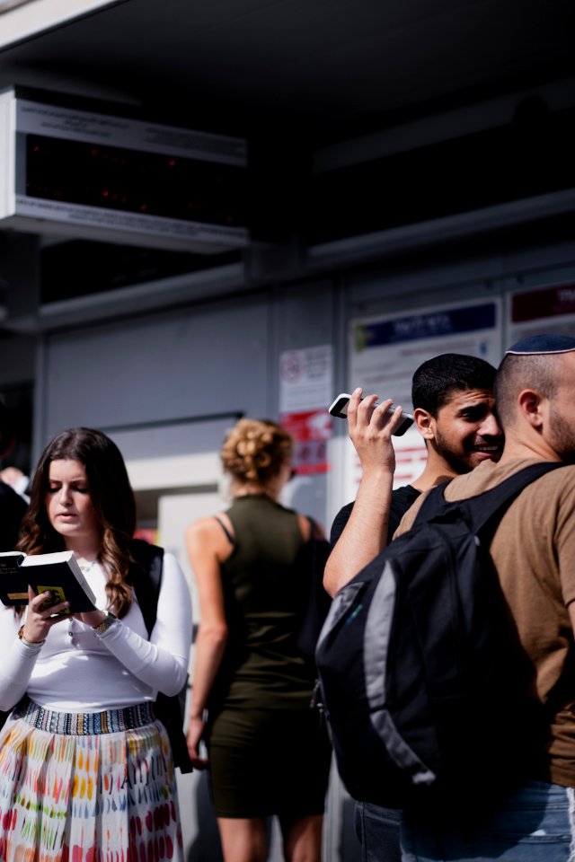 Views of a Jewish woman praying along Jaffa street in October of 2019 during the Sukkot holiday 06