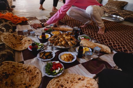 Views of a meal being served in June of 2019 at an Ezidi home in Wardia village in the Sinjar region 03