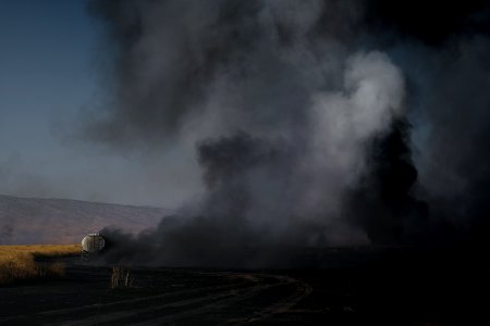 Views of fires spreading in summer of 2019 across villages near Shingal, being put out by Ezidi volunteers 17