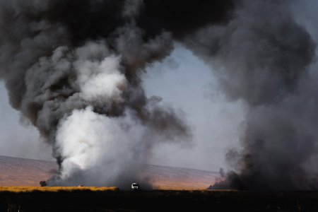 Views of fires spreading in summer of 2019 across villages near Shingal, being put out by Ezidi volunteers 13