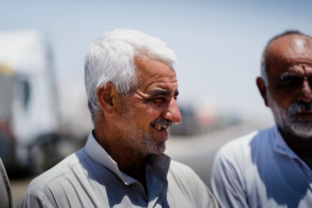 Views of interviews and meetings with Arab truck drivers in summer of 2019 waiting in Sinjar to deliver grain from Anbar and other Arab regions of Iraq 04