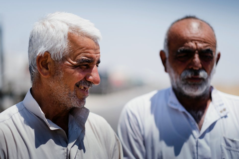 Views of interviews and meetings with Arab truck drivers in summer of 2019 waiting in Sinjar to deliver grain from Anbar and other Arab regions of Iraq 03