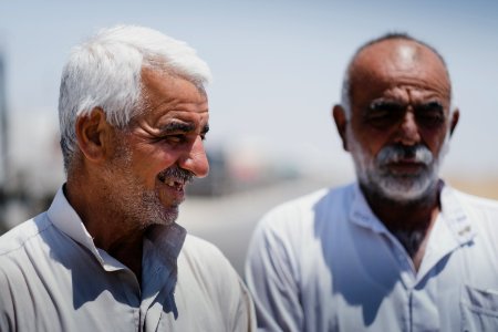 Views of interviews and meetings with Arab truck drivers in summer of 2019 waiting in Sinjar to deliver grain from Anbar and other Arab regions of Iraq 03