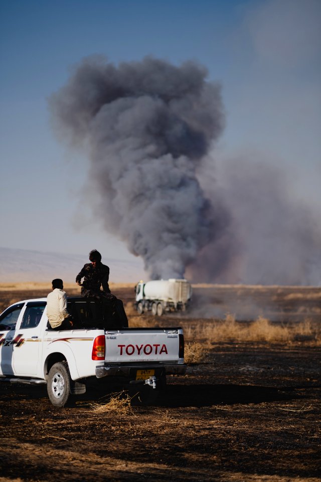 Views of fires spreading in summer of 2019 across villages near Shingal, being put out by Ezidi volunteers 29