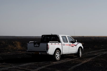 Views of fires spreading in summer of 2019 across villages near Shingal, being put out by Ezidi volunteers 18