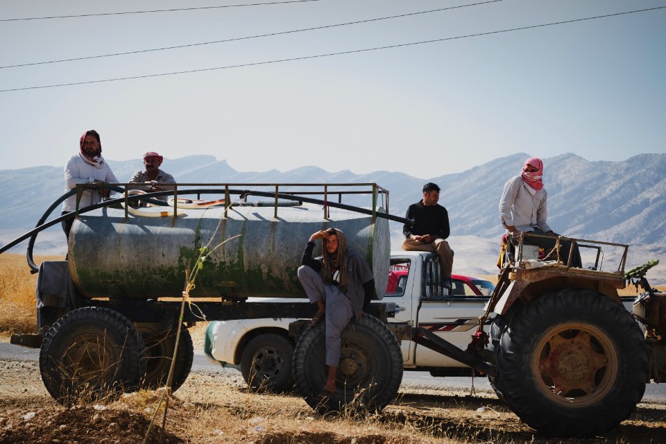 Views of fires spreading in summer of 2019 across villages near Shingal, being put out by Ezidi volunteers 09