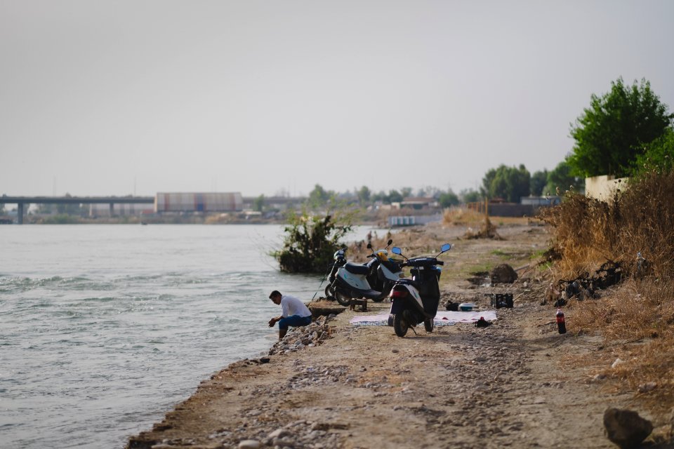 Views along the river Tigris in Mosul in 2019 when Moslawis go during the summer to cool down 14