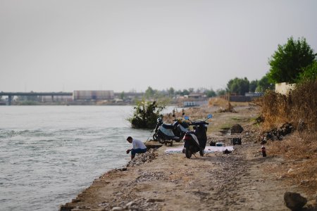 Views along the river Tigris in Mosul in 2019 when Moslawis go during the summer to cool down 14