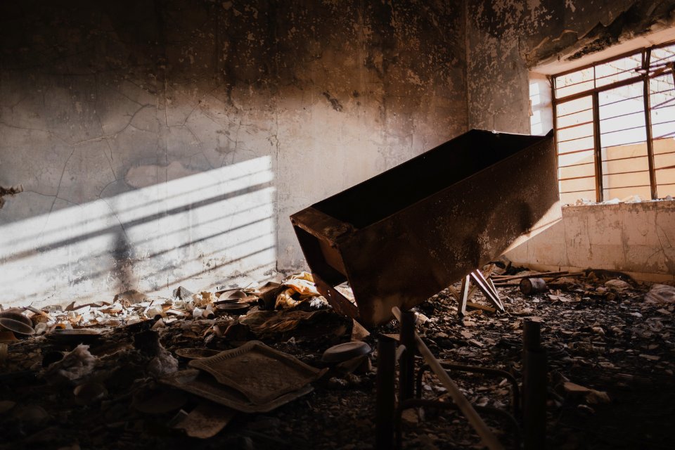 Views in June of 2019 of ruined buildings around the center of Shingal (Sinjar) town 11