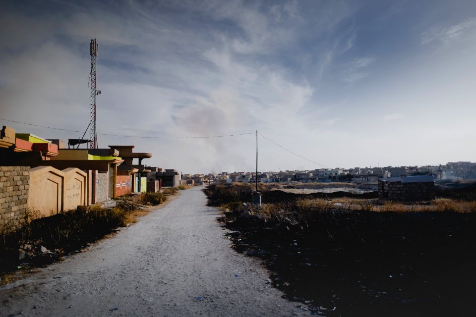 Views in June of 2019 of ruined buildings around the center of Shingal (Sinjar) town 01
