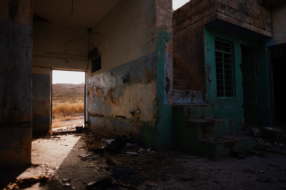 Views in June of 2019 of ruined buildings around the center of Shingal (Sinjar) town 31