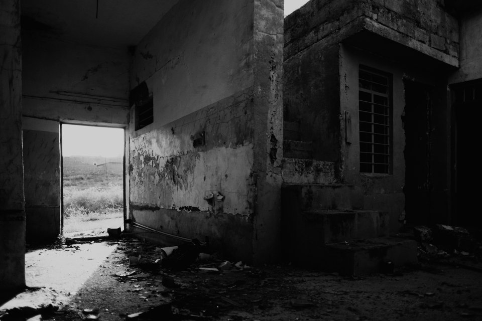 Views in June of 2019 of ruined buildings around the center of Shingal (Sinjar) town 30
