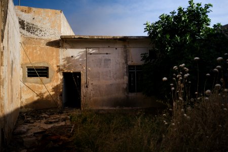 Views in June of 2019 of ruined buildings around the center of Shingal (Sinjar) town 06