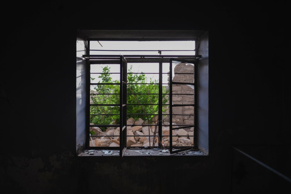 Views in June of 2019 of ruined buildings around the center of Shingal (Sinjar) town 17