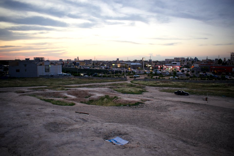 Views of pottery sherds, previous excavation sites, and the mound itself at 'Kelik Mishik' archaeological mound in Erbil 20
