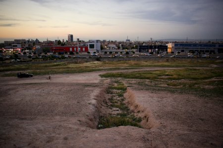 Views of pottery sherds, previous excavation sites, and the mound itself at 'Kelik Mishik' archaeological mound in Erbil 19