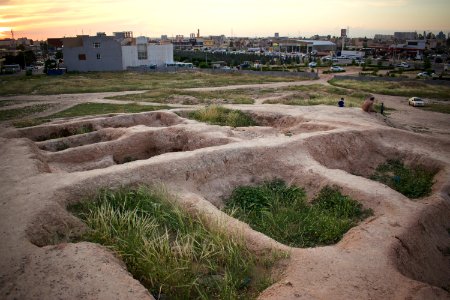Views of pottery sherds, previous excavation sites, and the mound itself at 'Kelik Mishik' archaeological mound in Erbil 11