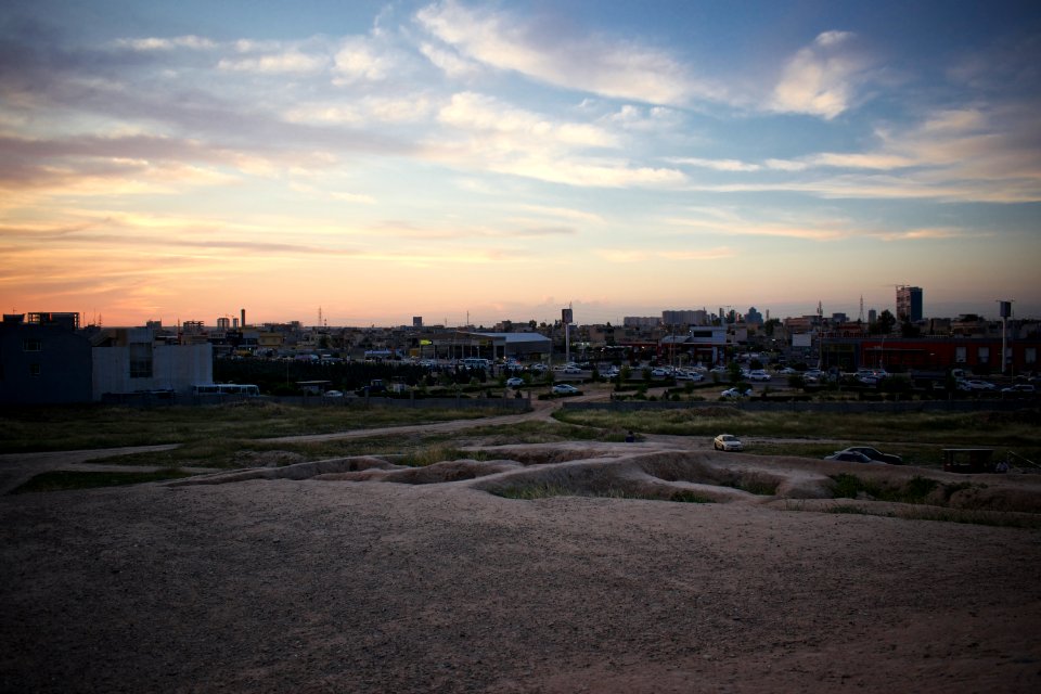 Views of pottery sherds, previous excavation sites, and the mound itself at 'Kelik Mishik' archaeological mound in Erbil 17