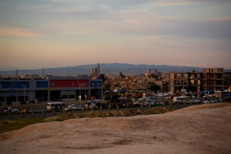 Views of pottery sherds, previous excavation sites, and the mound itself at 'Kelik Mishik' archaeological mound in Erbil 16