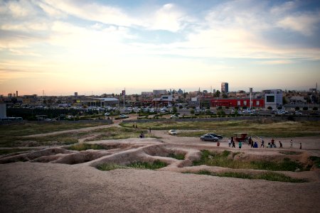 Views of pottery sherds, previous excavation sites, and the mound itself at 'Kelik Mishik' archaeological mound in Erbil 15