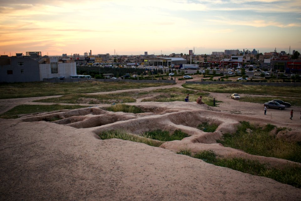 Views of pottery sherds, previous excavation sites, and the mound itself at 'Kelik Mishik' archaeological mound in Erbil 13