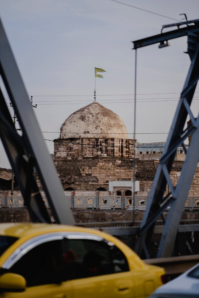 Views of the Aghawat Mosque in the old city of Mosul, from the old bridge over the Tigris in summer of 2019 after the war with the Islamic State 04