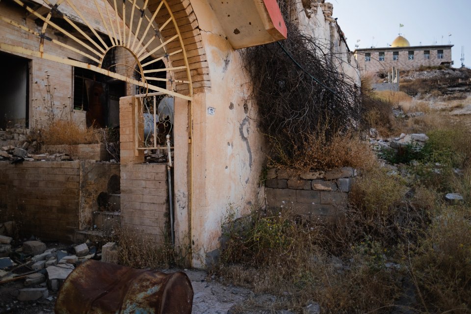 Views in June of 2019 of ruined buildings around the center of Shingal (Sinjar) town 38