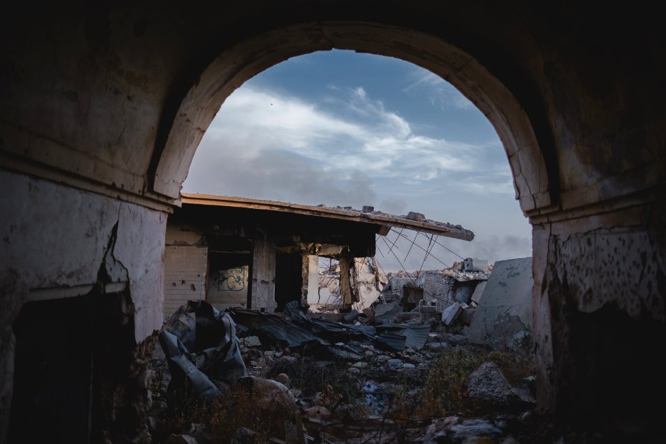 Views in June of 2019 of ruined buildings around the center of Shingal (Sinjar) town 45