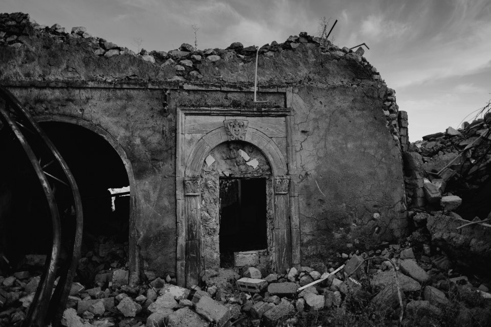 Views in June of 2019 of ruined buildings around the center of Shingal (Sinjar) town 46