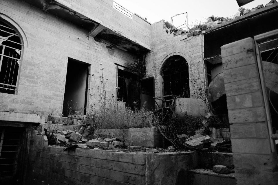 Views in June of 2019 of ruined buildings around the center of Shingal (Sinjar) town 39