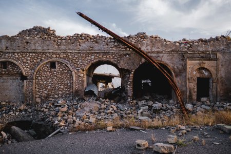 Views in June of 2019 of ruined buildings around the center of Shingal (Sinjar) town 42