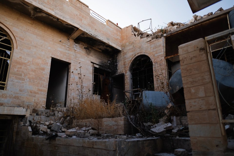 Views in June of 2019 of ruined buildings around the center of Shingal (Sinjar) town 40