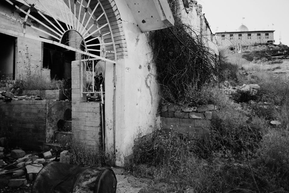 Views in June of 2019 of ruined buildings around the center of Shingal (Sinjar) town 37