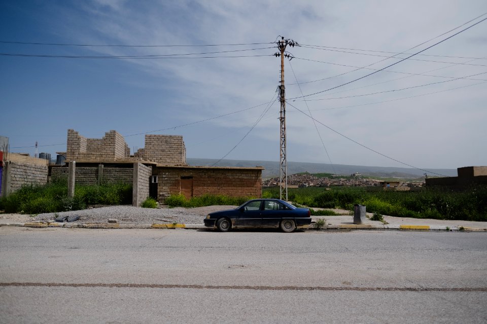 Views in May of 2019 around the main gate of the Ezidi Progress Party's main office in downtown Shingal 13