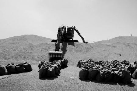 Views of the governmental grain depot in summer of 2019 in Shingal where Ezidi laborers are packing grain 05