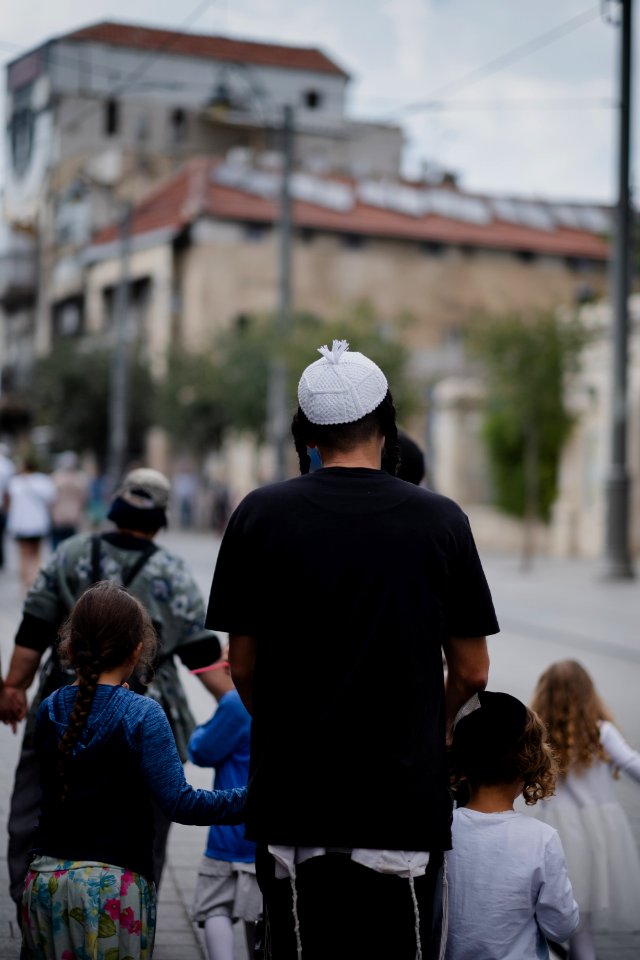 Views of an Orthodox family along Jaffa street in October of 2019 during the Sukkot holiday 02