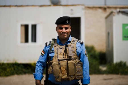 Views of Shia Kurdish police officer at the Shia shrine of Zakr Al-Deen in Shingal in April of 2019, following its destruction by the Islamic State 40