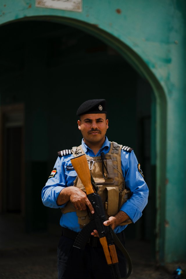Views of Shia Kurdish police officer at the Shia shrine of Zakr Al-Deen in Shingal in April of 2019, following its destruction by the Islamic State 44