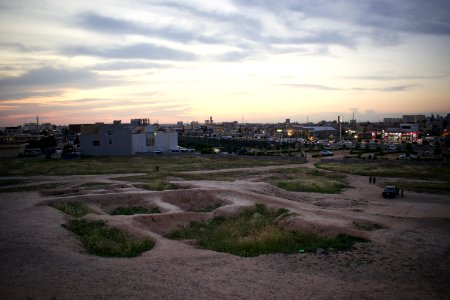 Views of pottery sherds, previous excavation sites, and the mound itself at 'Kelik Mishik' archaeological mound in Erbil 24