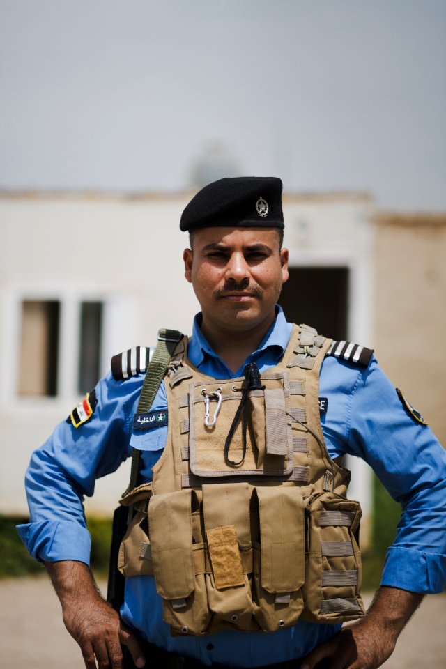 Views of Shia Kurdish police officer at the Shia shrine of Zakr Al-Deen in Shingal in April of 2019, following its destruction by the Islamic State 37