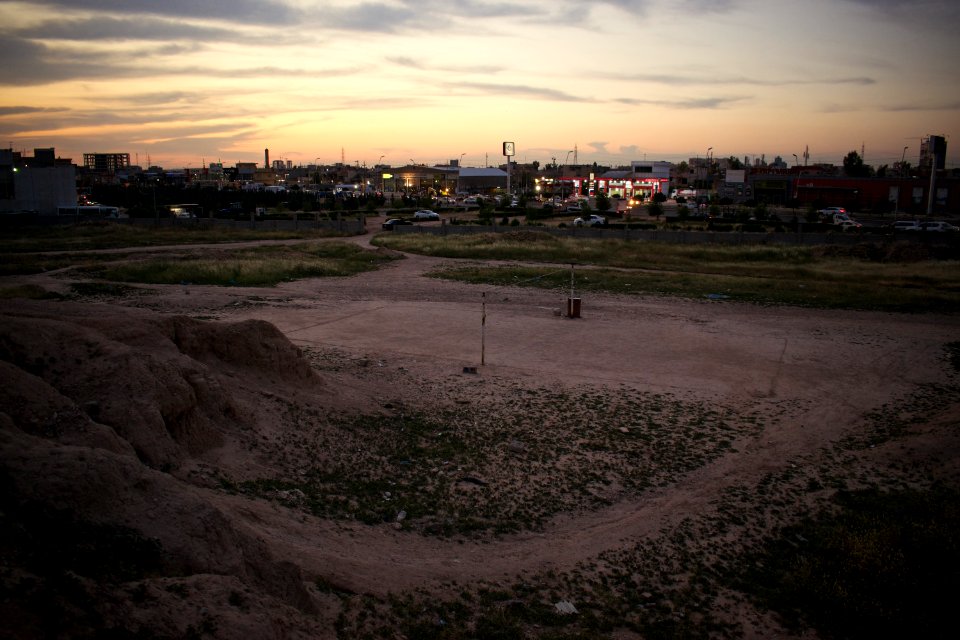 Views of pottery sherds, previous excavation sites, and the mound itself at 'Kelik Mishik' archaeological mound in Erbil 30