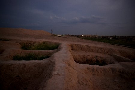 Views of pottery sherds, previous excavation sites, and the mound itself at 'Kelik Mishik' archaeological mound in Erbil 32