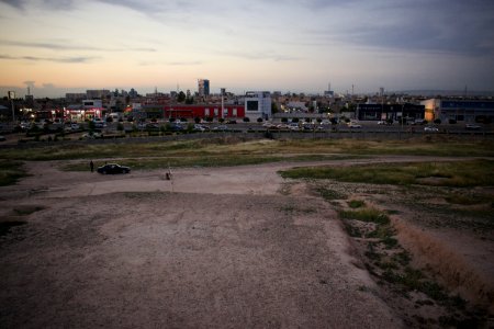 Views of pottery sherds, previous excavation sites, and the mound itself at 'Kelik Mishik' archaeological mound in Erbil 22