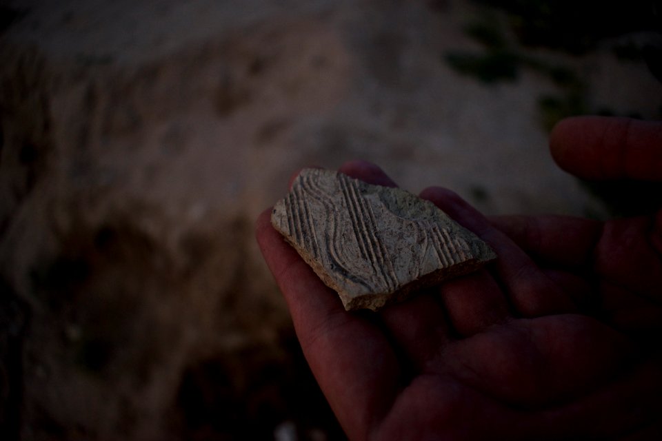Views of pottery sherds, previous excavation sites, and the mound itself at 'Kelik Mishik' archaeological mound in Erbil 36