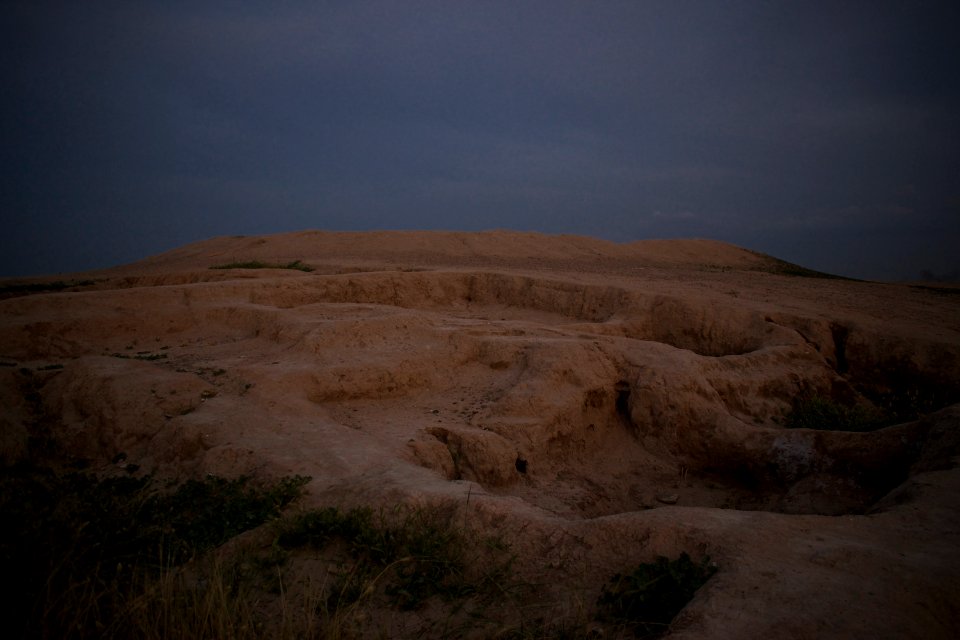 Views of pottery sherds, previous excavation sites, and the mound itself at 'Kelik Mishik' archaeological mound in Erbil 34