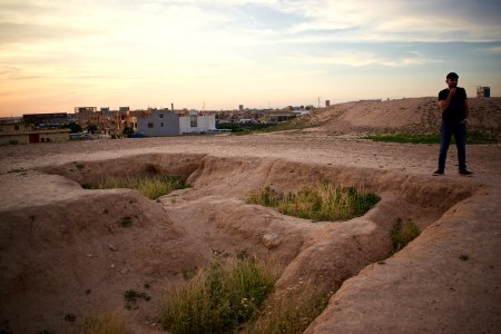 Views of pottery sherds, previous excavation sites, and the mound itself at 'Kelik Mishik' archaeological mound in Erbil 01