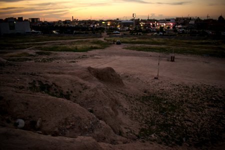 Views of pottery sherds, previous excavation sites, and the mound itself at 'Kelik Mishik' archaeological mound in Erbil 29